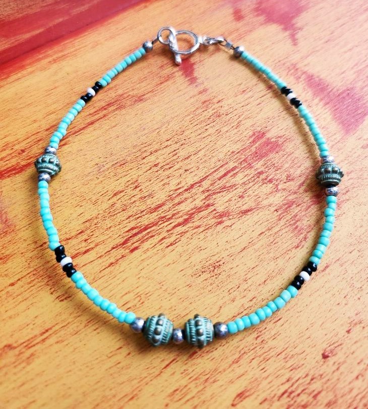 Glass seeds, metal beads 5mm, 10"